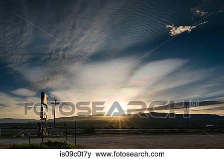 Thick dark clouds over desert landscape, Olancha, California, US View Large Photo Image Stock Photo - Thick dark clouds over desert landscape, Olancha, California, US. Fotosearch