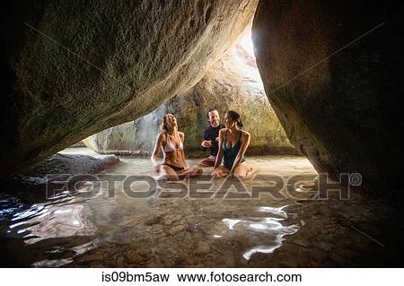 Three friends exploring flooded grotto, Virgin Gorda, British Virgin Islands View Large Photo Image Stock Photo - Three friends exploring flooded grotto, Virgin Gorda, British Virgin Islands. Fotosearch
