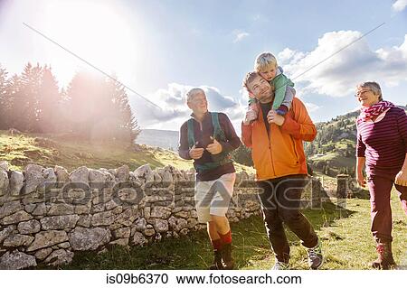 Three generation family, hiking, in rural setting, Geneva, Switzerland, Europe View Large Photo Image Stock Image - Three generation family, hiking, in rural setting, Geneva, Switzerland, Europe. Fotosearch