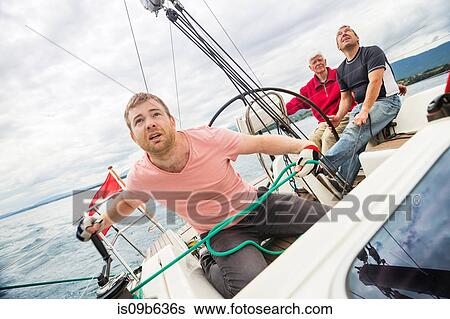 Three generation family on sailing boat, Geneva, Switzerland, Europe View Large Photo Image Stock Photograph - Three generation family on sailing boat, Geneva, Switzerland, Europe. Fotosearch