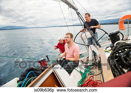 Three generation family on sailing boat, Geneva, Switzerland, Europe View Large Photo Image Stock Photography - Three generation family on sailing boat, Geneva, Switzerland, Europe. Fotosearch