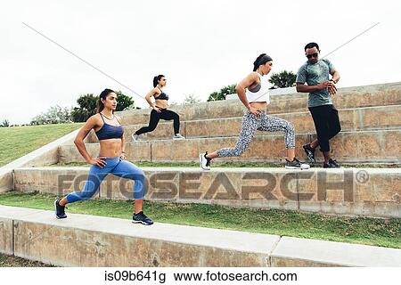 Three women working out with personal trainer, Point Park, Miami Beach, Florida, USA View Large Photo Image Stock Image - Three women working out with personal trainer, Point Park, Miami Beach, Florida, USA. Fotosearch