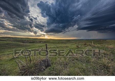Thunderstorm forms at sunset over rural Ogallala, Nebraska, US View Large Photo Image Stock Photography - Thunderstorm forms at sunset over rural Ogallala, Nebraska, US. Fotosearch