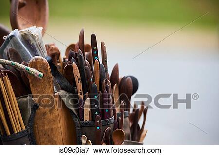 Tool belt filled with wooden spoons and knives View Large Photo Image Stock Photo - Tool belt filled with wooden spoons and knives. Fotosearch