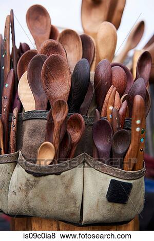 Tool belt filled with wooden spoons and knives View Large Photo Image Stock Photo - Tool belt filled with wooden spoons and knives. Fotosearch