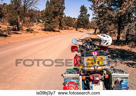 Stock Photo - Touring motorcycle on roadside, Terrebonne, Oregon, USA. Fotosearch