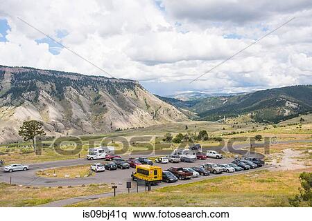 Tourist carpark in valley, Yellowstone National Park, Wyoming, USA View Large Photo Image Stock Photography - Tourist carpark in valley, Yellowstone National Park, Wyoming, USA. Fotosearch
