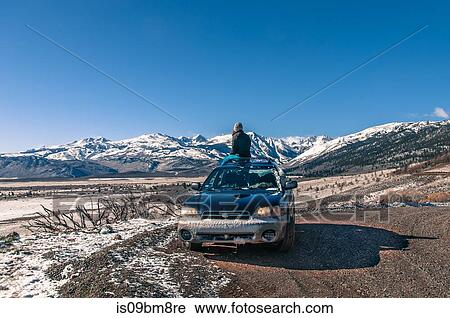 Tourist enjoying view on way to hot springs near Bridgeport, California, USA View Large Photo Image Stock Image - Tourist enjoying view on way to hot springs near Bridgeport, California, USA. Fotosearch