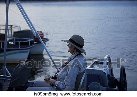 Tourist on boat tour, Zambezi, Zambia View Large Photo Image Stock Photography - Tourist on boat tour, Zambezi, Zambia. Fotosearch