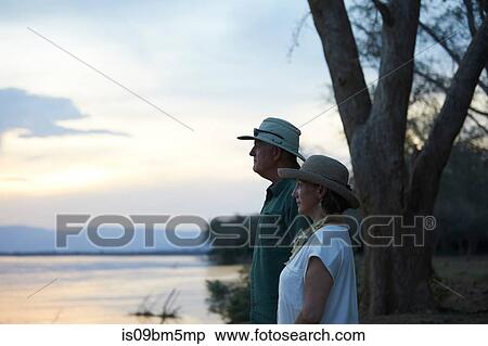 Tourists looking out to sea, Zambezi, Zambia View Large Photo Image Stock Photography - Tourists looking out to sea, Zambezi, Zambia. Fotosearch