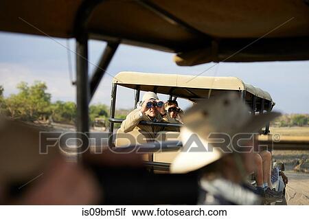 Tourists on safari tour, Kasane, North-West, Botswana View Large Photo Image Stock Image - Tourists on safari tour, Kasane, North-West, Botswana. Fotosearch