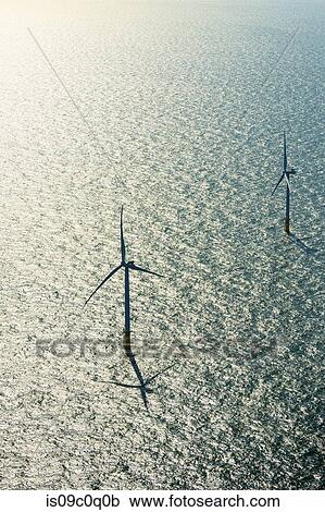 Two wind turbines in offshore wind farm in the Borselle windfield, aerial view, Domburg, Zeeland, Netherlands View Large Photo Image Stock Image - Two wind turbines in offshore wind farm in the Borselle windfield, aerial view, Domburg, Zeeland, Netherlands. Fotosearch