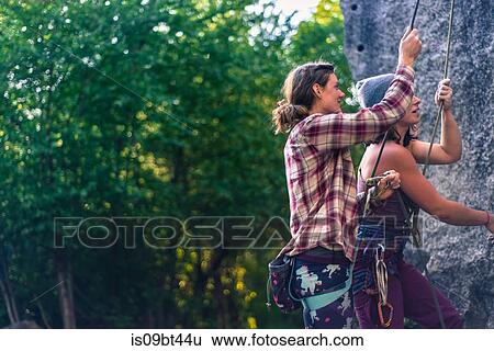 Two young female rock climbers 0eparing at rock face, Smoke Bluffs, Squamish, British Columbia, Canada View Large Photo Image Stock Photograph - Two young female rock climbers 0eparing at rock face, Smoke Bluffs, Squamish, British Columbia, Canada. Fotosearch