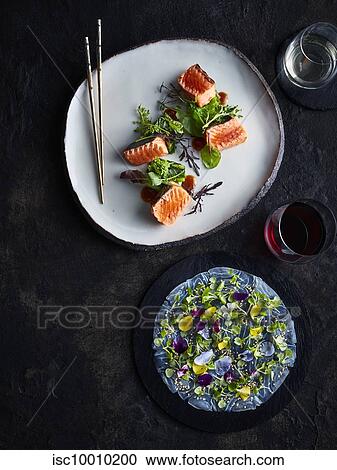 Usuzuki saikou salmon robatayaki with yuzu miso and edible flowers View Large Photo Image Stock Image - Usuzuki saikou salmon robatayaki with yuzu miso and edible flowers. Fotosearch