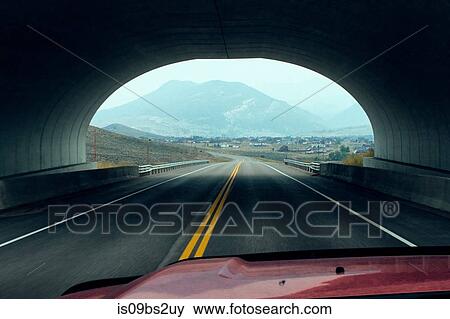 Vehicle driving through tunnel, Silverthorne, Colorado, USA View Large Photo Image Stock Photo - Vehicle driving through tunnel, Silverthorne, Colorado, USA. Fotosearch