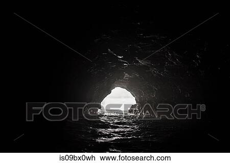 Stock Image - View from inside of cave to sea, Na Pali Coast, Kauai, Hawaii. Fotosearch