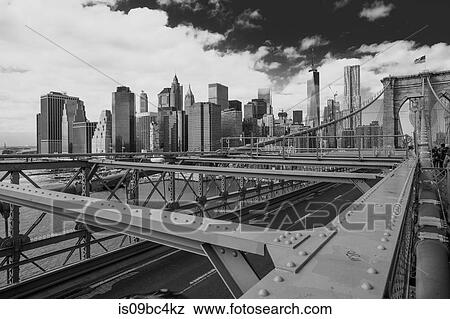 View of Brooklyn Bridge and skyscrapers, B&W, New York, USA View Large Photo Image Stock Photo - View of Brooklyn Bridge and skyscrapers, B&W, New York, USA. Fotosearch