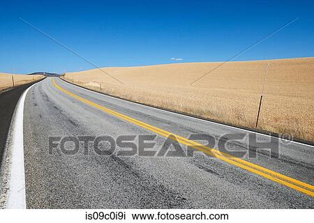 Wheat field along road in countryside, Tensed, Idaho, United States View Large Photo Image Stock Image - Wheat field along road in countryside, Tensed, Idaho, United States. Fotosearch