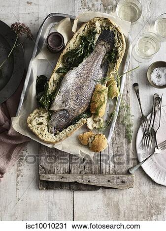 Whole fish baked in bread View Large Photo Image Stock Image - Whole fish baked in bread. Fotosearch