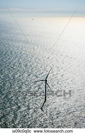 Wind turbine in offshore wind farm in the Borselle windfield, aerial view, Domburg, Zeeland, Netherlands View Large Photo Image Stock Image - Wind turbine in offshore wind farm in the Borselle windfield, aerial view, Domburg, Zeeland, Netherlands. Fotosearch