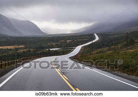 Winding rural road through Gros Morne National Park, Newfoundland, Canada View Large Photo Image Stock Image - Winding rural road through Gros Morne National Park, Newfoundland, Canada. Fotosearch