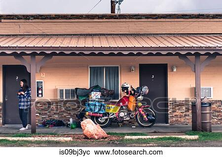 Woman and touring motorcycle, Zion Lodge, Utah, USA View Large Photo Image Stock Image - Woman and touring motorcycle, Zion Lodge, Utah, USA. Fotosearch