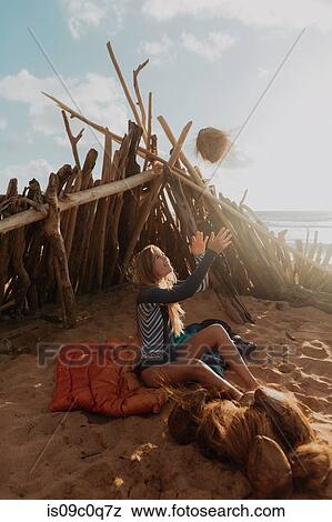 Woman by tent happy with her collection of coconuts, Princeville, Hawaii, US View Large Photo Image Stock Photo - Woman by tent happy with her collection of coconuts, Princeville, Hawaii, US. Fotosearch