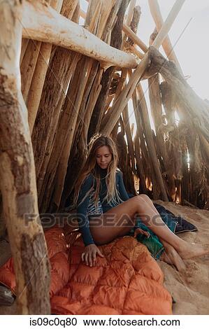 Woman camping on sandy beach, Princeville, Hawaii, US View Large Photo Image Stock Image - Woman camping on sandy beach, Princeville, Hawaii, US. Fotosearch