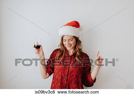 Woman dancing with wine, white background View Large Photo Image Stock Photo - Woman dancing with wine, white background. Fotosearch