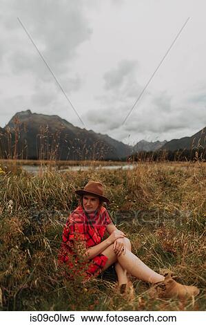 Woman exploring wilderness by lake, Queenstown, Canterbury, New Zealand View Large Photo Image Stock Photography - Woman exploring wilderness by lake, Queenstown, Canterbury, New Zealand. Fotosearch