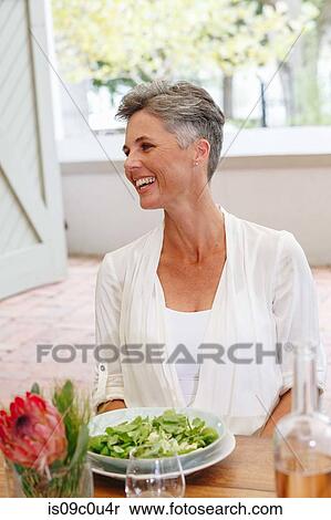 Woman having lunch in restaurant, Cape Town, South Africa View Large Photo Image Stock Photography - Woman having lunch in restaurant, Cape Town, South Africa. Fotosearch