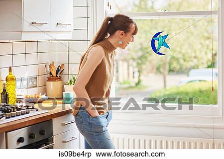 Woman in kitchen View Large Photo Image Stock Photography - Woman in kitchen. Fotosearch