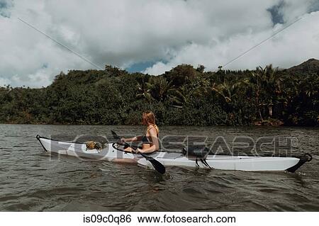 Woman kayaking, Princeville, Hawaii, US View Large Photo Image Stock Photograph - Woman kayaking, Princeville, Hawaii, US. Fotosearch