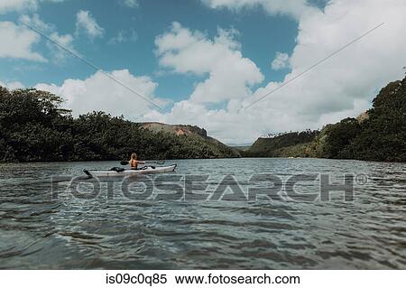 Woman kayaking, Princeville, Hawaii, US View Large Photo Image Stock Photography - Woman kayaking, Princeville, Hawaii, US. Fotosearch