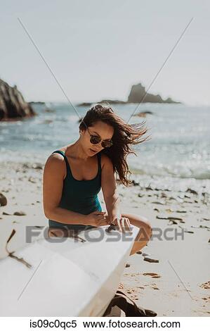 Woman preparing kayak on beach, Big Sur, California, United States View Large Photo Image Stock Photography - Woman preparing kayak on beach, Big Sur, California, United States. Fotosearch