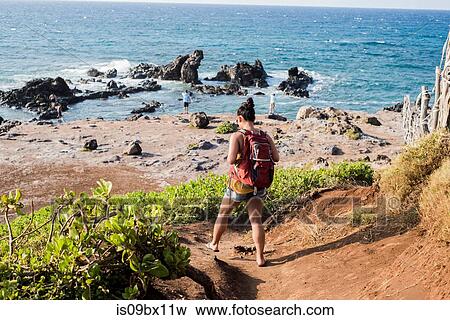 Woman visiting beach, Hookipia Beach, Maui, Hawaii View Large Photo Image Stock Photo - Woman visiting beach, Hookipia Beach, Maui, Hawaii. Fotosearch