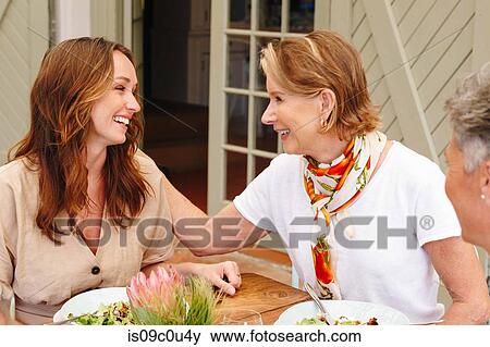 Women having lunch in restaurant, Cape Town, South Africa View Large Photo Image Stock Photo - Women having lunch in restaurant, Cape Town, South Africa. Fotosearch