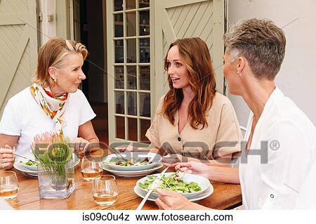 Women having lunch in restaurant, Cape Town, South Africa View Large Photo Image Stock Photo - Women having lunch in restaurant, Cape Town, South Africa. Fotosearch