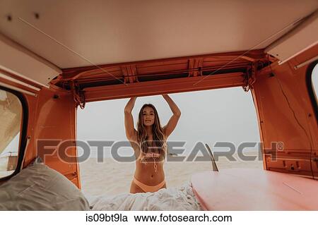 Young female surfer at back of recreational vehicle, portrait, Jalama, California, USA View Large Photo Image Stock Image - Young female surfer at back of recreational vehicle, portrait, Jalama, California, USA. Fotosearch