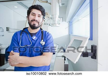 Young male radiographer in radiology department, portrait View Large Photo Image Stock Image - Young male radiographer in radiology department, portrait. Fotosearch