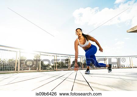 Young woman exercising outdoors, South Point Park, Miami Beach, Florida, USA View Large Photo Image Stock Photograph - Young woman exercising outdoors, South Point Park, Miami Beach, Florida, USA. Fotosearch