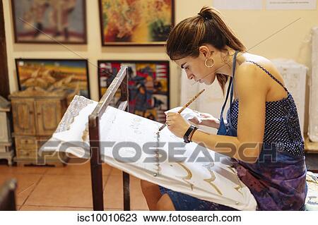 Young woman practicing Batik in art classroom, a traditional form of Indonesian painting View Large Photo Image Stock Image - Young woman practicing Batik in art classroom, a traditional form of Indonesian painting. Fotosearch