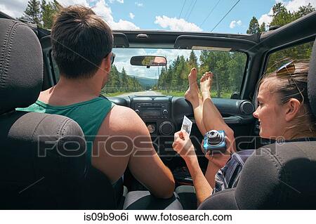 Young woman with boyfriend on road trip holding instant photograph, Breckenridge, Colorado, USA View Large Photo Image Stock Image - Young woman with boyfriend on road trip holding instant photograph, Breckenridge, Colorado, USA. Fotosearch