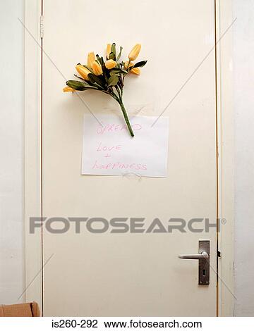 Bunch of flowers on door View Large Photo Image Stock Image - Bunch of flowers on door. Fotosearch