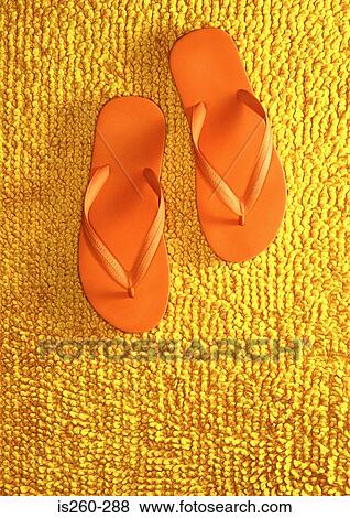 Pair of orange flip flops View Large Photo Image Stock Photo - Pair of orange flip flops. Fotosearch
