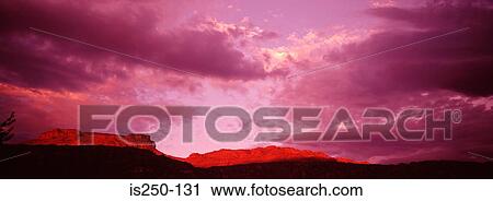 Stock Image - Rock formation at sunset. Fotosearch