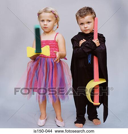 Picture - Two children wearing costumes. Fotosearch