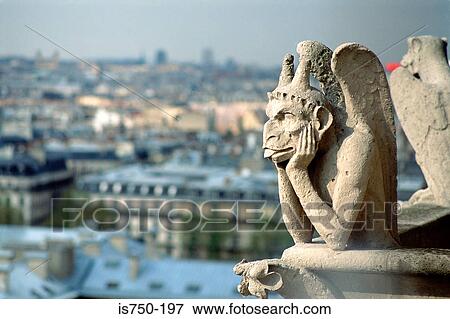 Stock Photo - Gargoyle on Notre-Dame Paris. Fotosearch