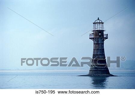 Stock Photography - Lighthouse on coast of Wales. Fotosearch