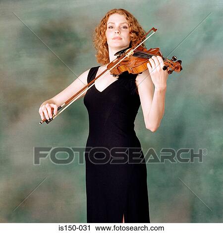Portrait of female violinist View Large Photo Image Stock Image - Portrait of female violinist. Fotosearch